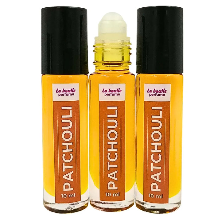Patchouli roll-on perfume bottles La Boulle with black caps on a white background