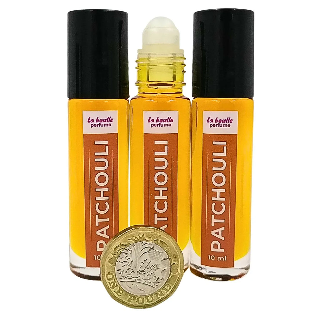 Patchouli roll-on perfume bottles La Boulle with black caps on a white background