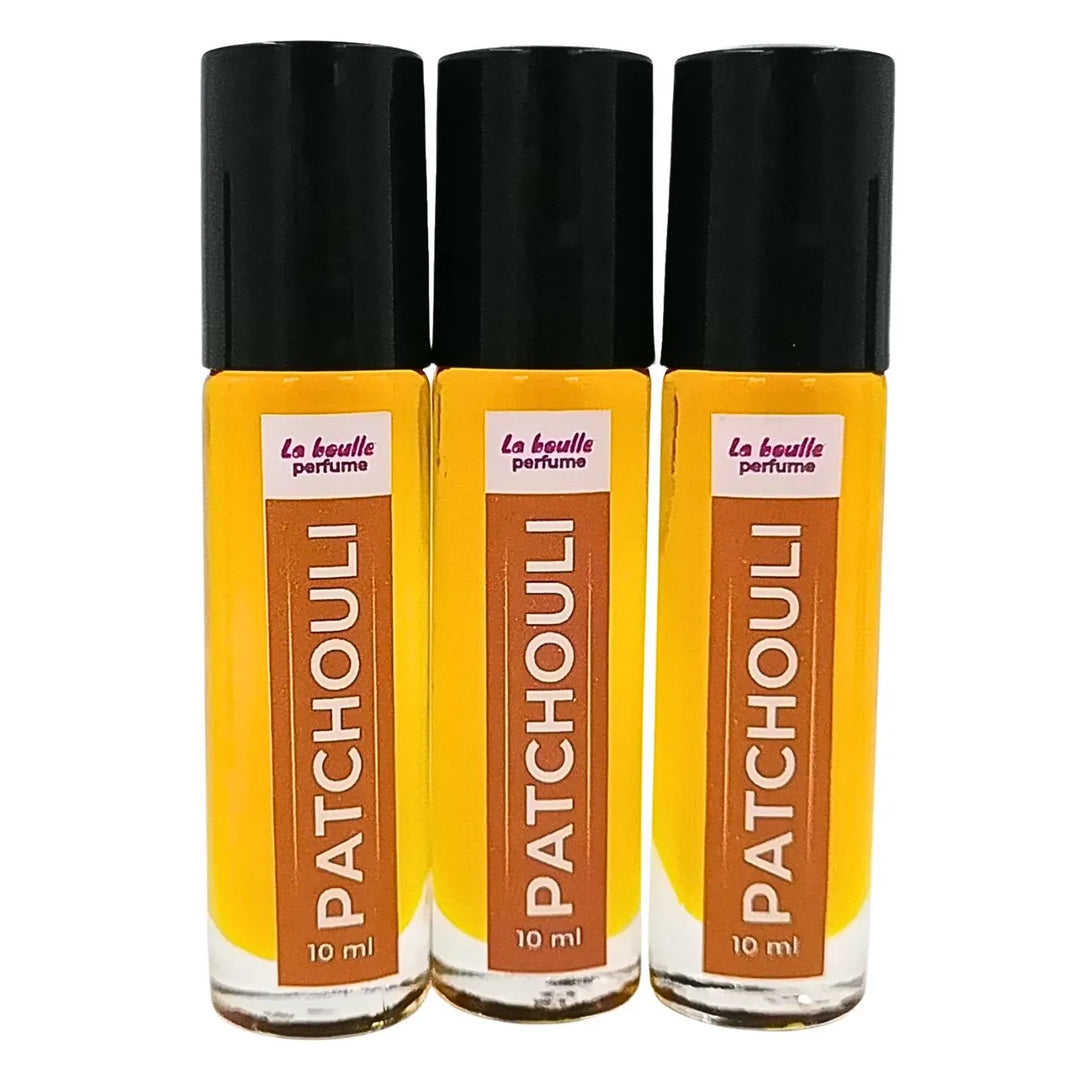 Patchouli roll-on perfume bottles La Boulle with black caps on a white background