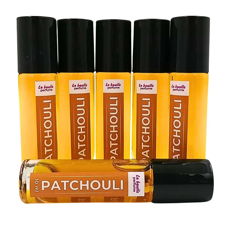 Patchouli roll-on perfume bottles La Boulle with black caps on a white background