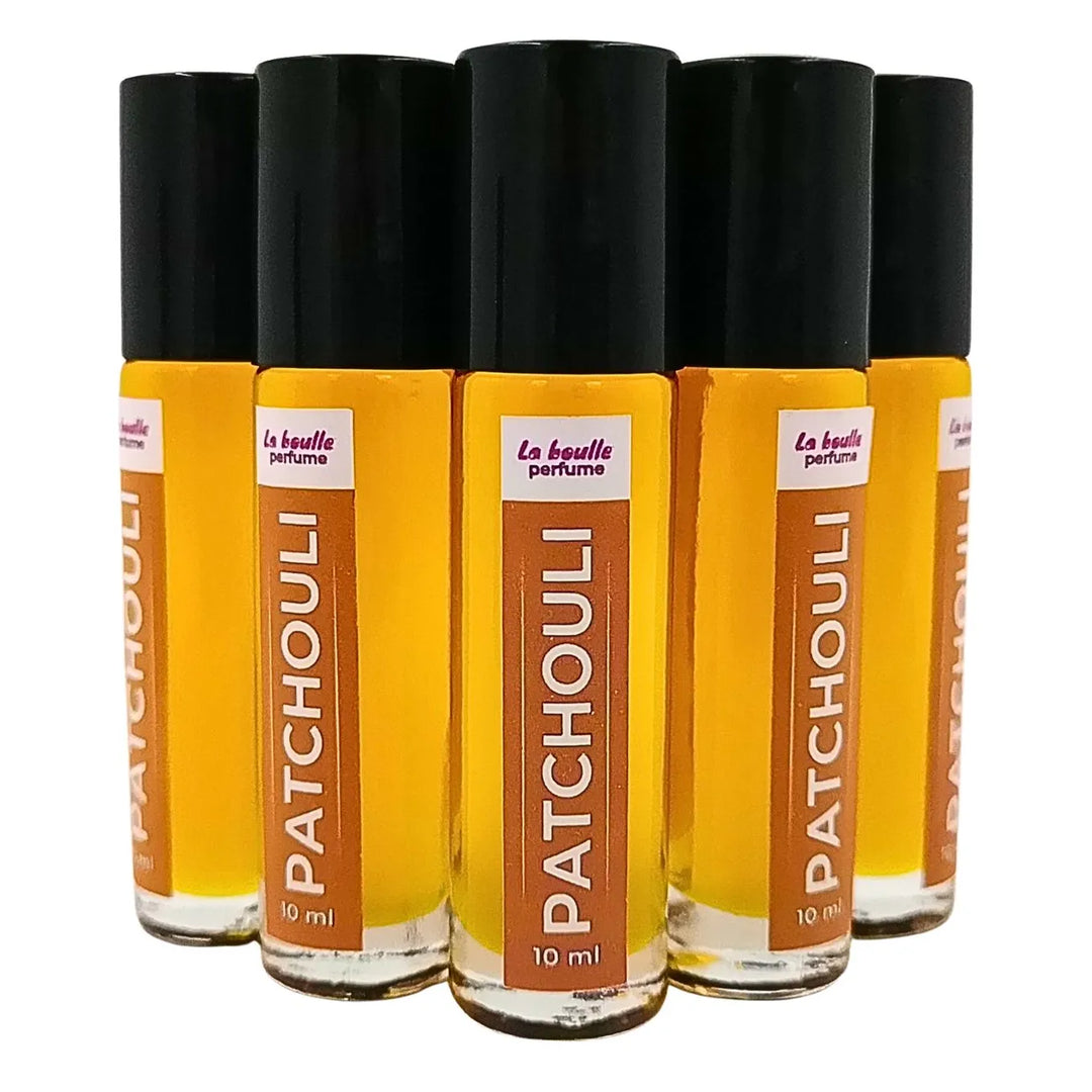 Patchouli roll-on perfume bottles La Boulle with black caps on a white background