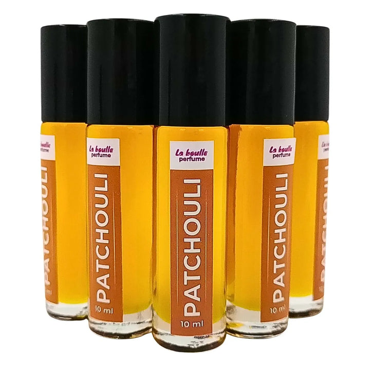 Patchouli roll-on perfume bottles La Boulle with black caps on a white background