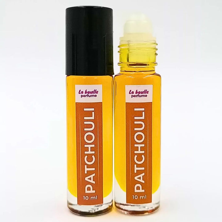 Patchouli roll-on perfume bottles La Boulle with black caps on a white background