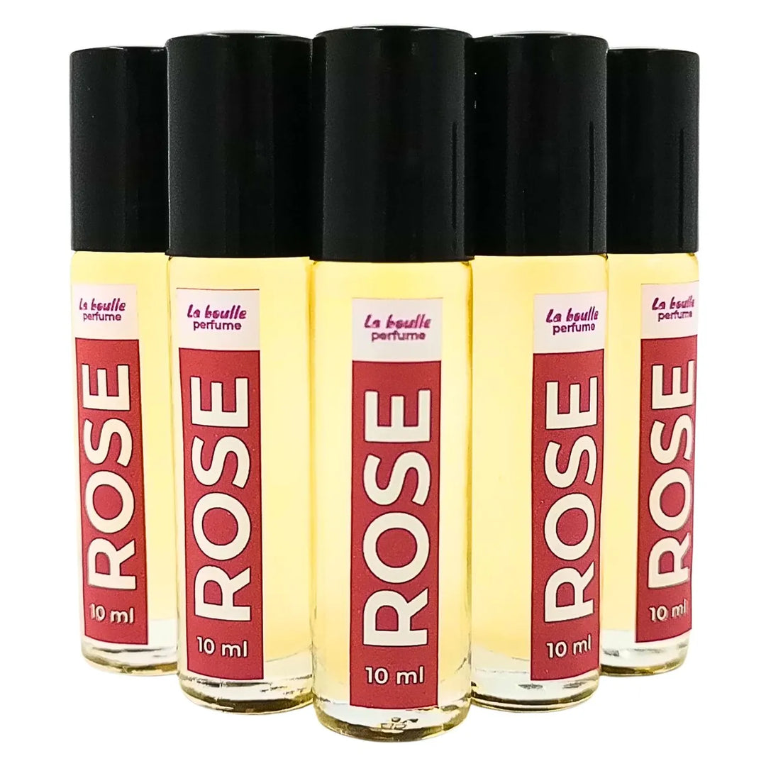Rose roll-on perfume bottles La Boulle with black caps on a white background