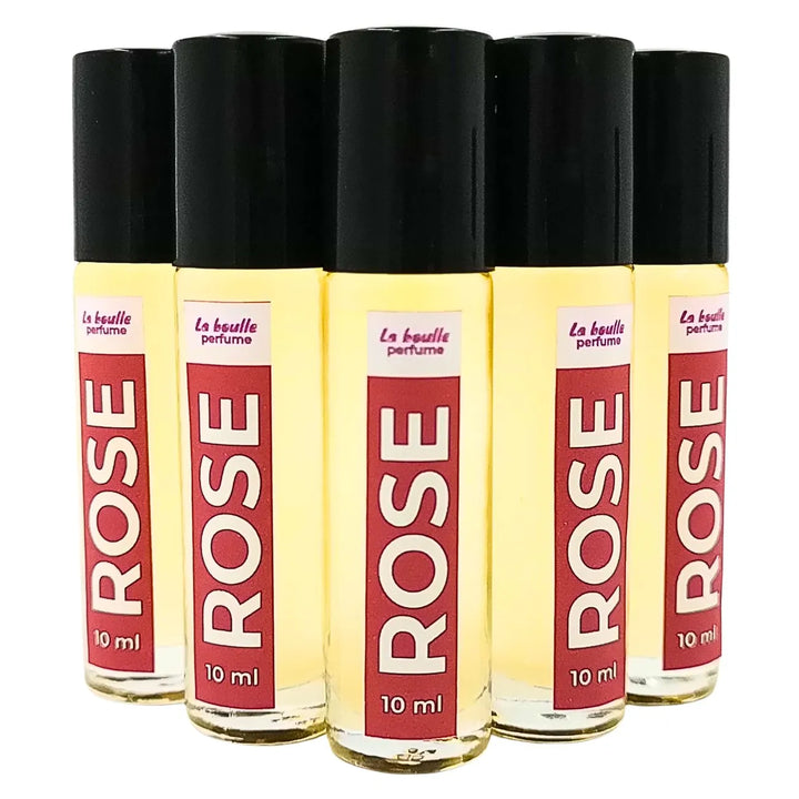 Rose roll-on perfume bottles La Boulle with black caps on a white background