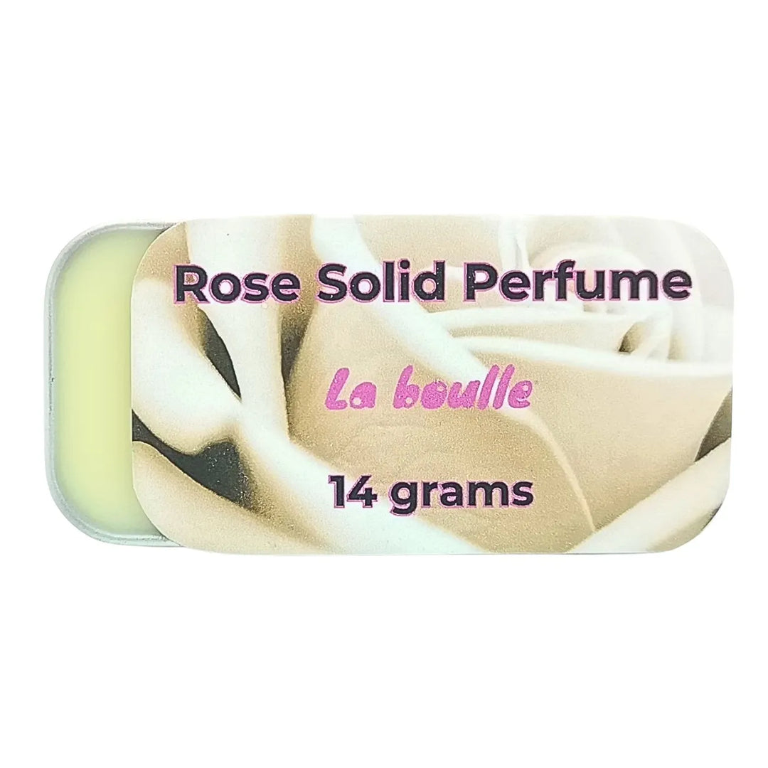 Rose solid natural perfume balm, La Boulle, on a white background