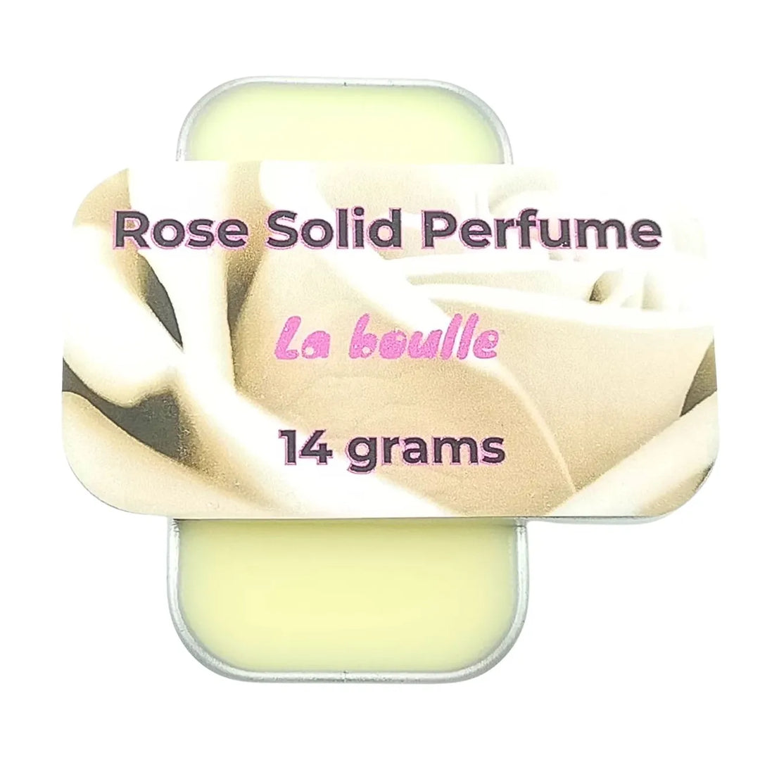 Rose solid natural perfume balm, La Boulle, on a white background