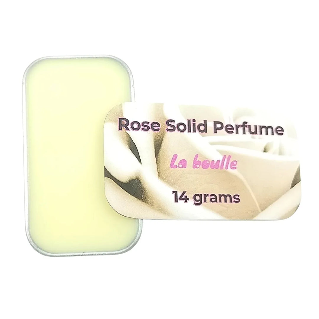 Rose solid natural perfume balm, La Boulle, on a white background