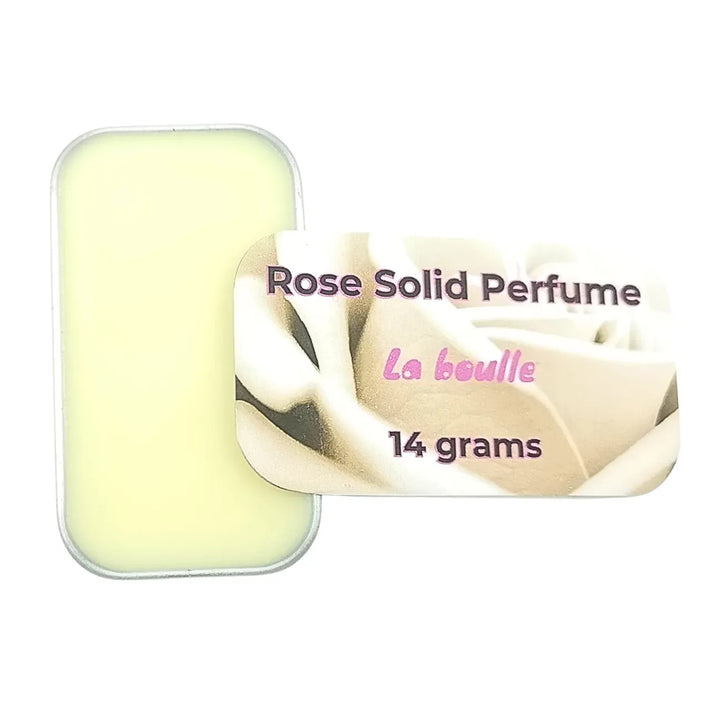 Rose solid natural perfume balm, La Boulle, on a white background