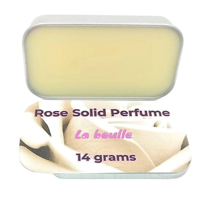Rose solid natural perfume balm, La Boulle, on a white background