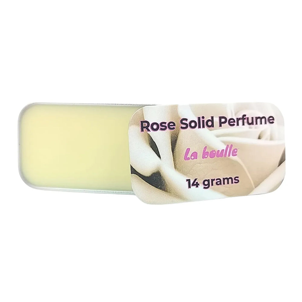 Rose solid natural perfume balm, La Boulle, on a white background