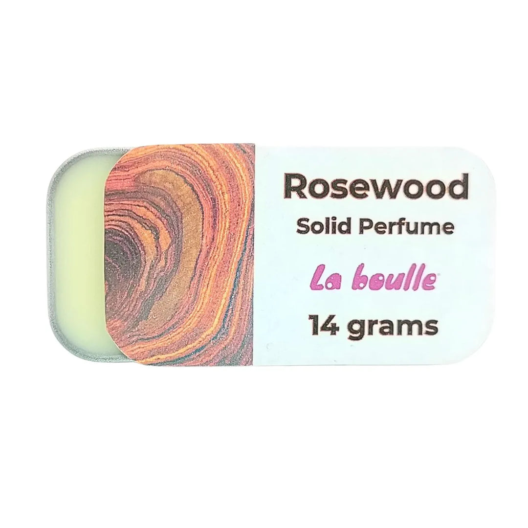 Rosewood solid natural perfume balm, La Boulle, on a white background